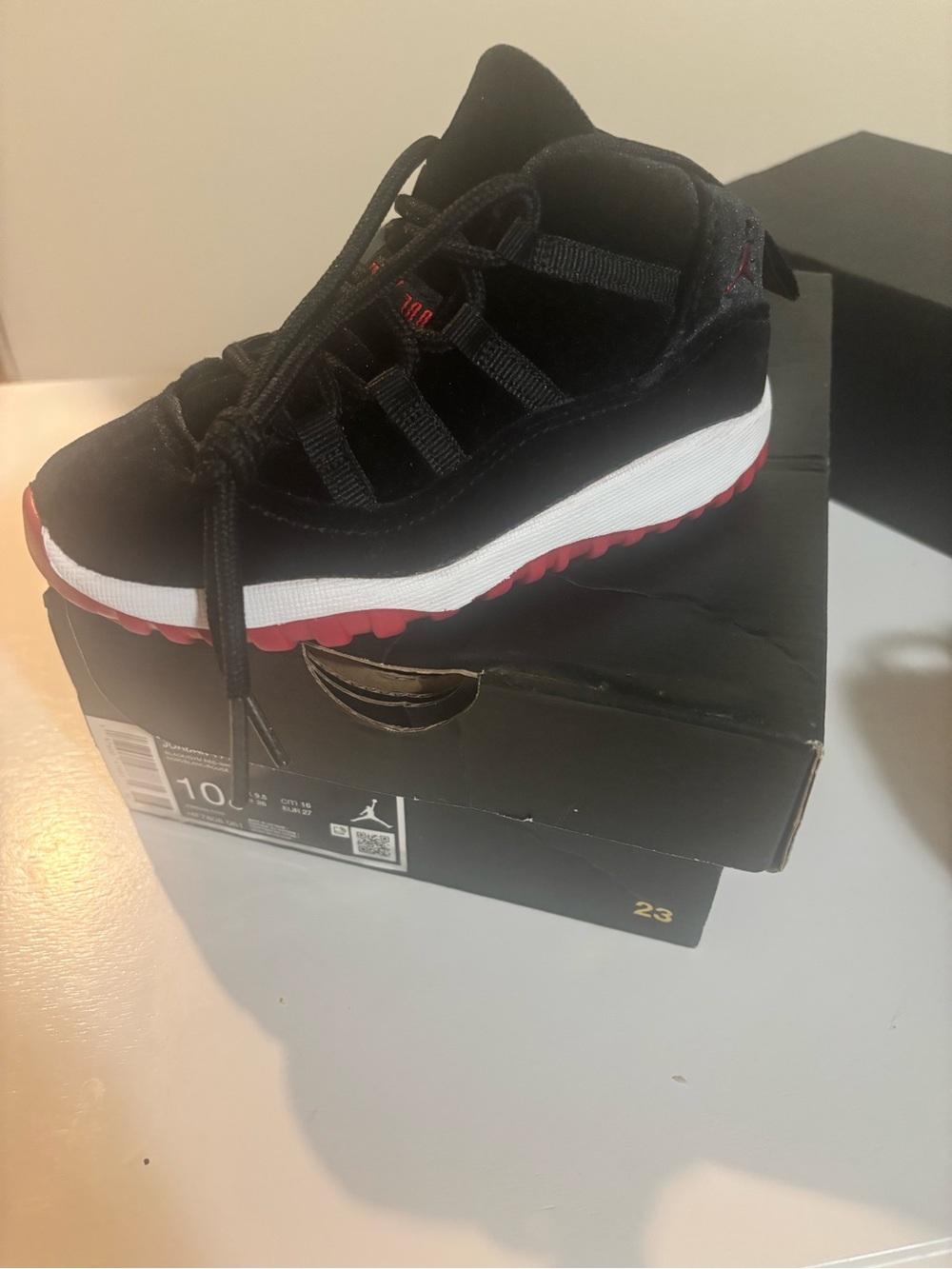 Jordan Kids Black and Red Retro Low Top Sneaker